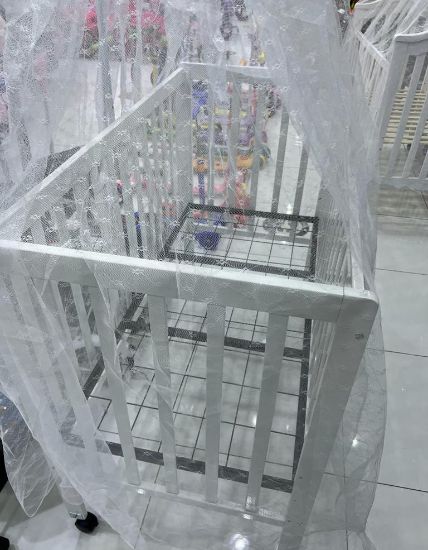 صورة سرير اطفال خشب